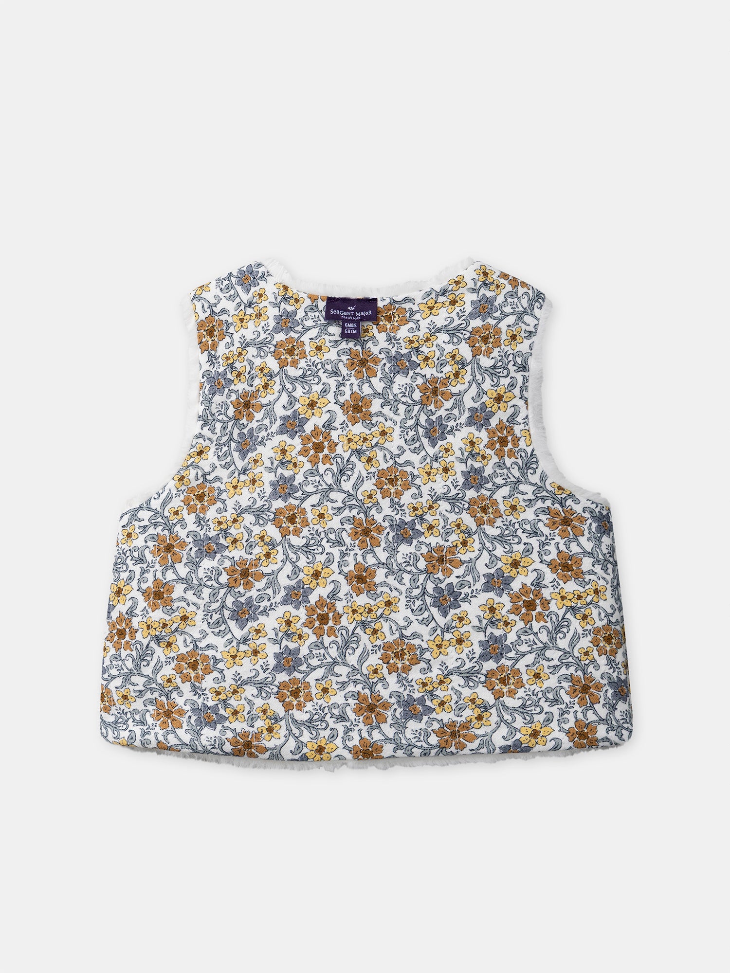 Gilet réversible blanc en fourrure ou imprimé fleuri Bébé Fille